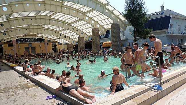 In the  60% covered big thermal pool has water massage